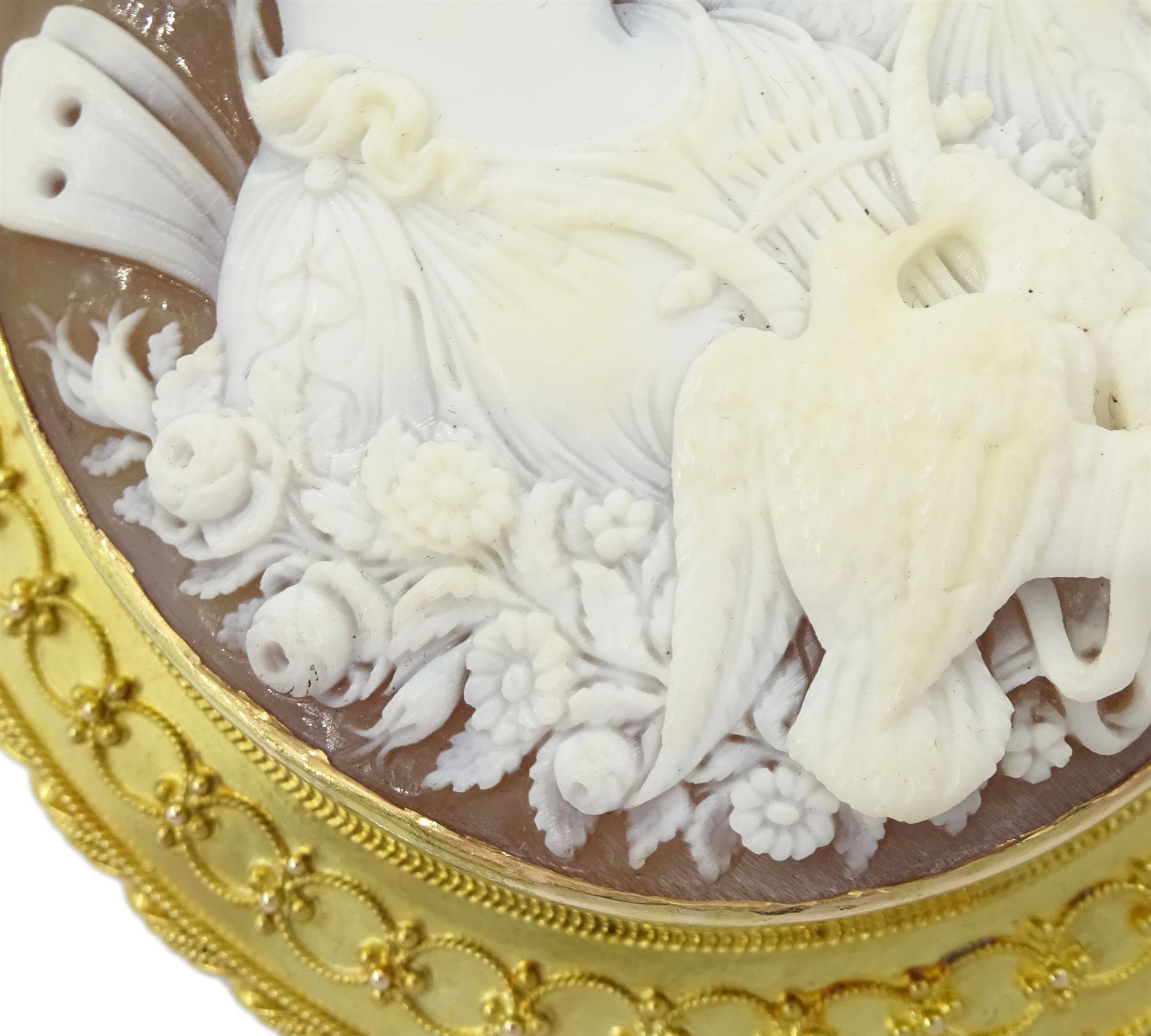 Victorian fine cameo brooch depicting Cupid and Psyche, in 18ct gold Etruscan Revival gold wirework mount, the reverse indistinctly signed Lamary, in original fitted silk and velvet lined case