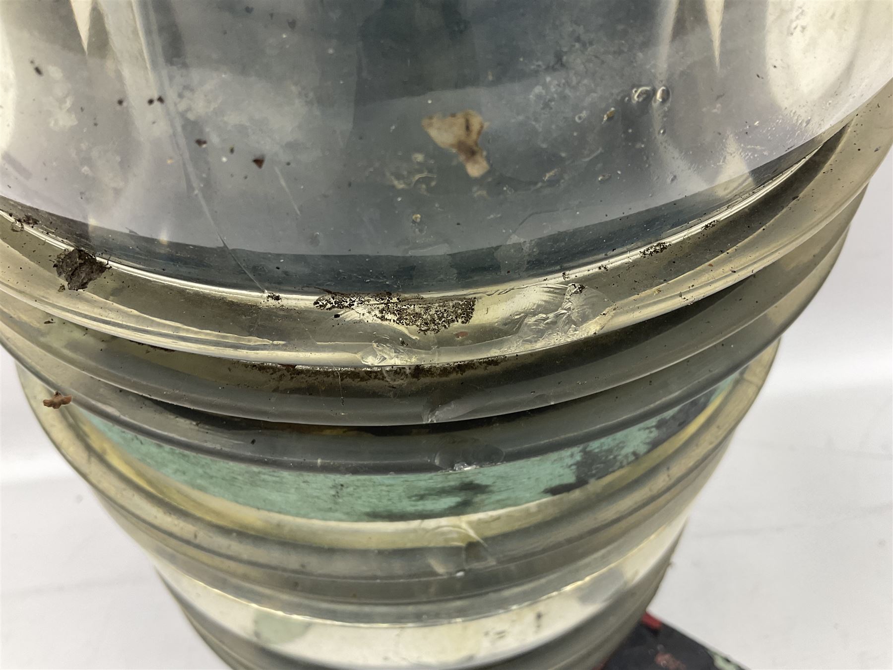 Two port and starboard brass lamps, each with a plaque marked 'Noack as Lanterne KL.A Serie 700 Type 704D Babord', ribbed green and red glass shades, H44cm