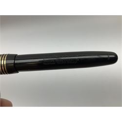 Vintage Swan Mabie Todd lever fill fountain pen in coral red, the nib a/f marked 14K, together with two further vintage Swan Mabie Todd fountain pens, the first example with lever fill, the other leverless, each with black body, one with nib marked 14ct, (3) 