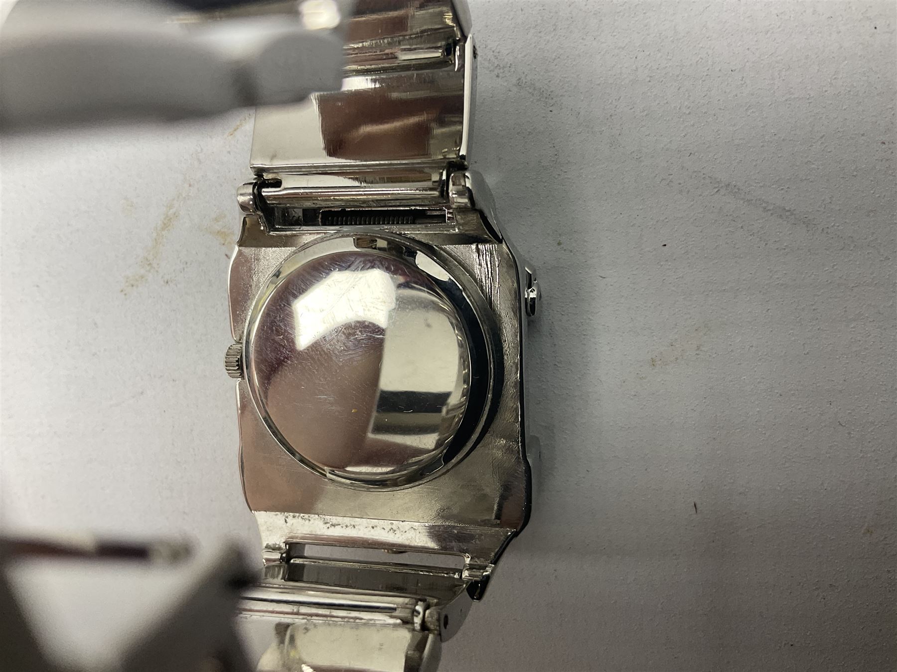 Four X Data stainless steel wristwatches, two Marc Gay wristwatches and one other, all with cover plates