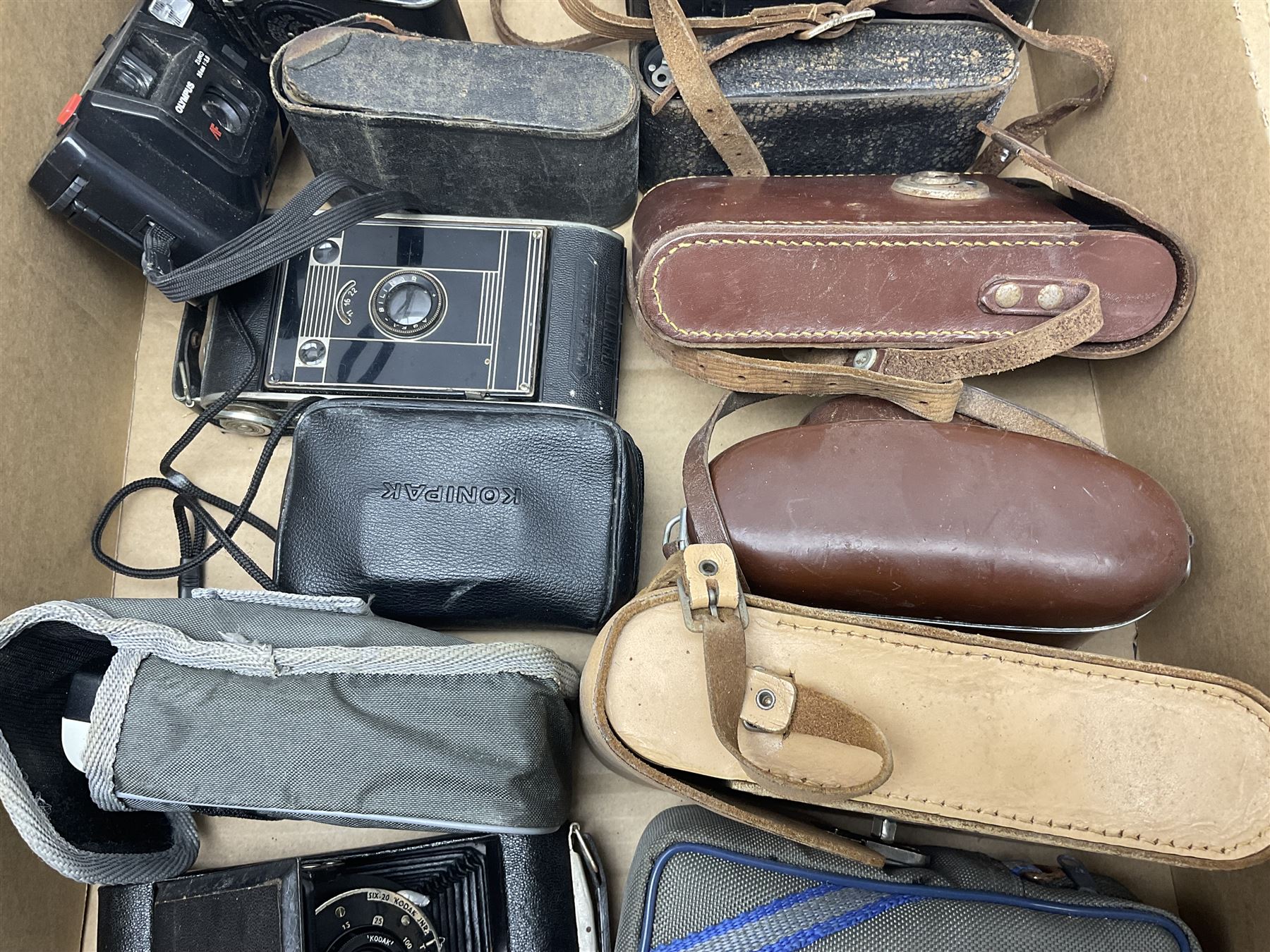 Large collection of cameras to include folding and SLR examples, including Rank Aldis, Agfa, Yashica, etc