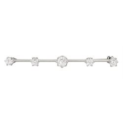 Early 20th century 15ct white gold five stone old cut diamond brooch, principle diamond approx 0.55 carat, total diamond weight approx 1.30 carat