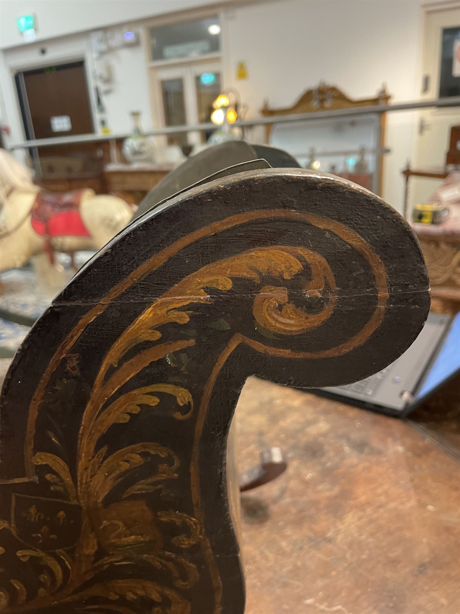 Unusual 18th century small Northern European wooden sled, with curved scroll back, the sides painted with coastal shipping scenes, the interior with removable zinc liner, upon curved irons painted with flower heads, H36cm W56cm D29cm