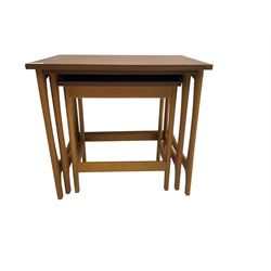 Mid-to late 20th century teak nest of three tables, rectangular top with shaped end supports