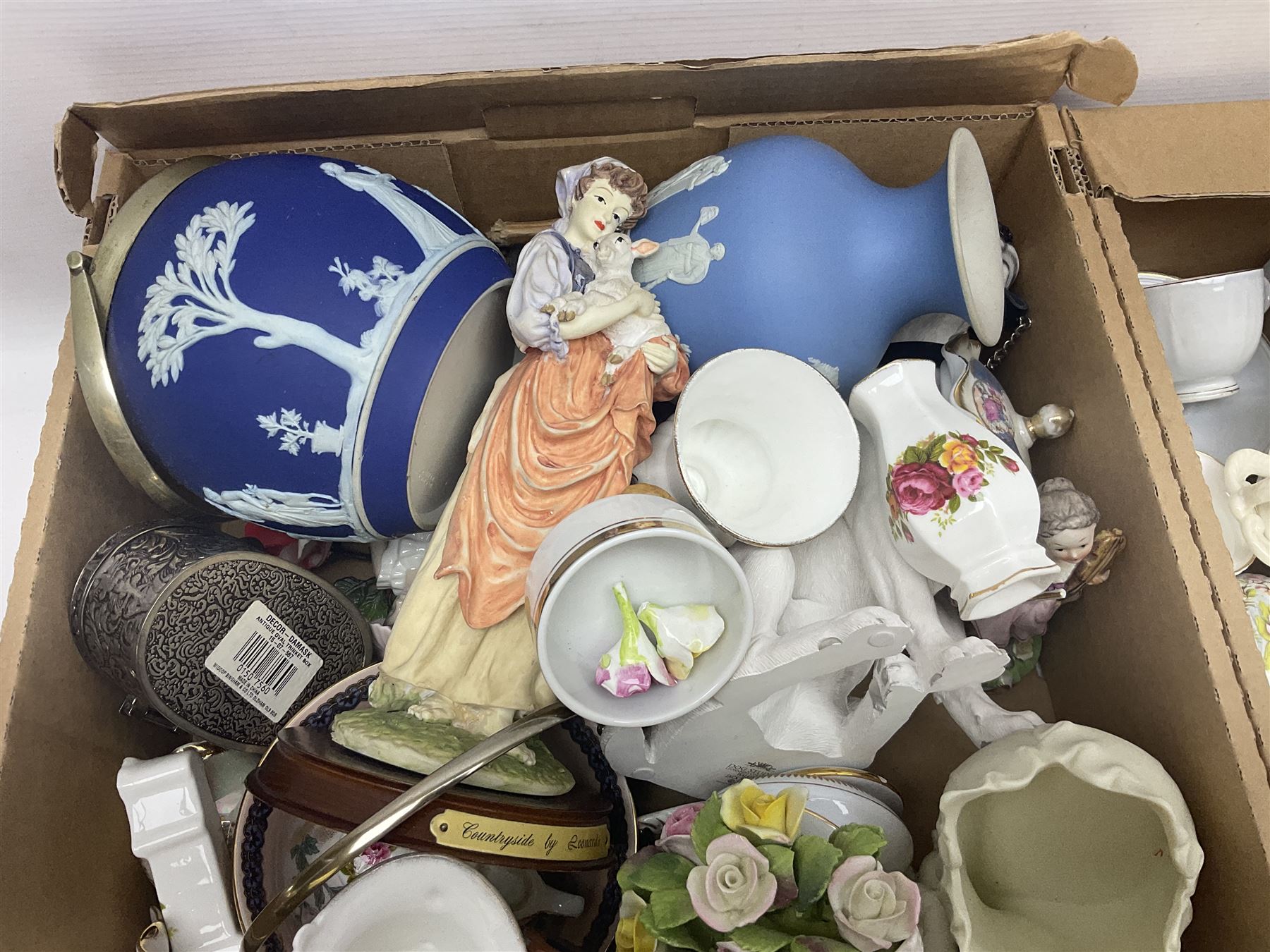 Wedgwood Jasperware biscuit barrel and vase, together with a collection of other ceramics including trinket boxes, flower displays and figures, etc in three boxes