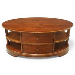 Willis & Gambier - oval coffee table, the moulded oval top above two central frieze drawer...