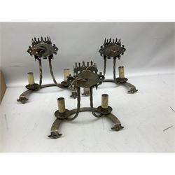Gothic style iron chandelier with drip pans and twisted branches together with three matching twin wall sconces