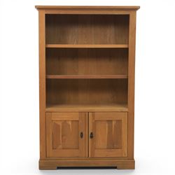 Light oak open bookcase fitted with three shelves, two cupboards, below
