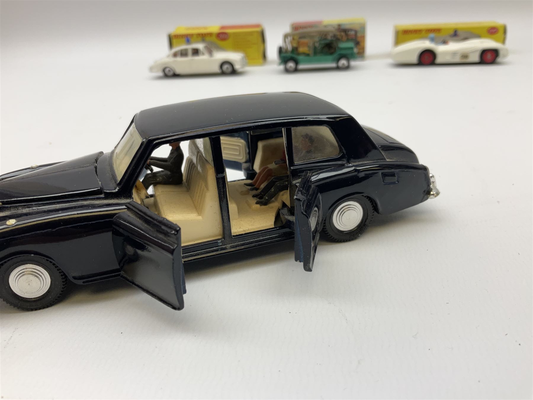 Dinky - Mercedes Benz Racing Car RN 36, No.237; Motorway Police Car No.269; Austin Mini-Moke No.342; Beechcraft S 35 Bonanza Aircraft with two pieces of luggage No.710; all boxed: and Rolls Royce Phantom V Limousine No.152; box base only with no cover (5)