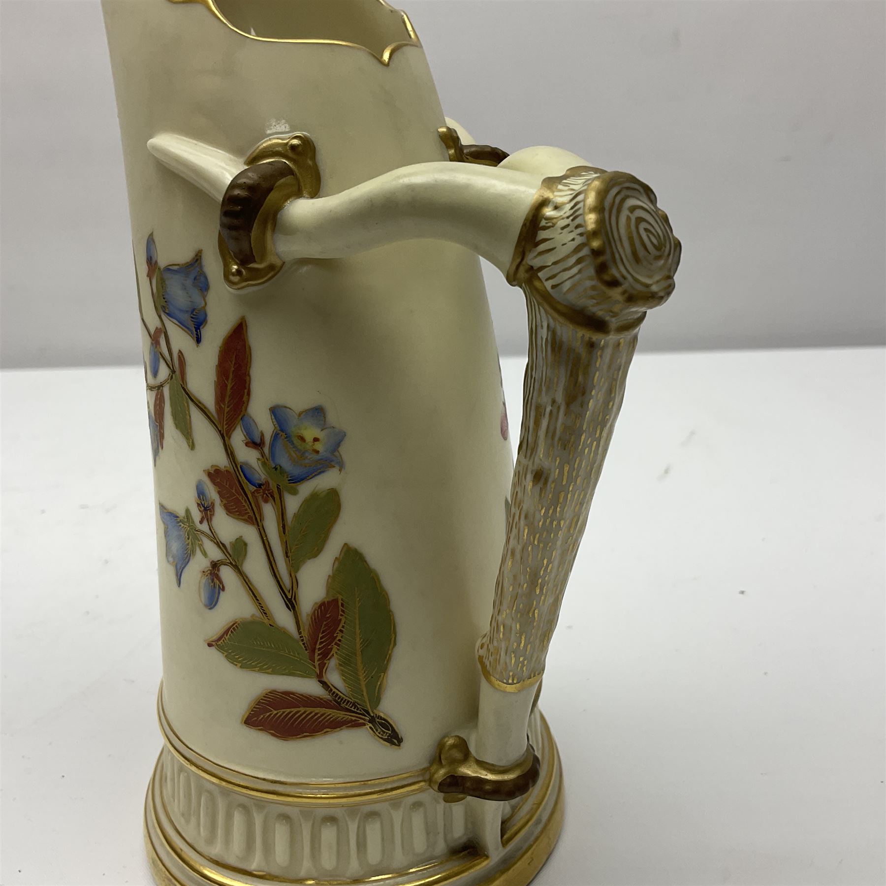 Royal Worcester tusk jug, blush ivory ground, with floral design, stamped 1116 to the base,, together with pair figures of a young boy and girl in the style on Kate Greenaway 