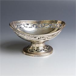 Indian silver bon bon dish, of oval form with pierced foliate decoration to sides and foot...