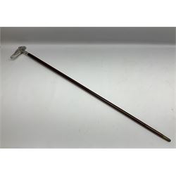 Art Deco style Italian 'Rivestito' covered silver walking stick handle, modelled in the form of a swan, stamped 'R', upon a silver collar hallmarked Birmingham 1986, makers mark DH-L, and hardwood shaft, L96cm

Provenance by vendor repute: 
This walking cane comes from a private collection amassed by the current vendors mother who was an Antique dealer specialising in walking sticks, working at the Portobello Road Antique Market in London for over forty years. 
In 1988 the prop crew from LWT (now ITV) visited Portobello Road looking for, amongst other items, a signature stick for David Suchet to use in his portrayal of Agatha Christie's Poirot. 
At the time this particular walking stick was one of five in possession. The prop crew chose and purchased another of the five which was then used by Suchet throughout all seventy episodes of the much loved series. 
Following the conclusion of the series Suchet was gifted his particular cane, which has been loaned to and can now be seen at the Agatha Christie Gallery at the Torquay Museum. 
