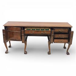 Georgian design mahogany sideboard, the rectangular top with moulded gadrooned edge, fitted with a central frieze drawer flanked by cupboard doors, raised upon cabriole legs terminating in ball and claw feet