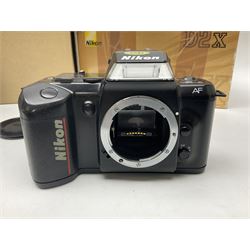 Nikon F-401 camera body, serial no. 2064766, together with Nikon Shutter Speed range, serial no.106395, and other Nikon equipment and camera bodies 