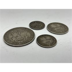German East Africa 1892 one rupie, 1906 half rupie, and two quarter rupie coins dated 1910, 1913