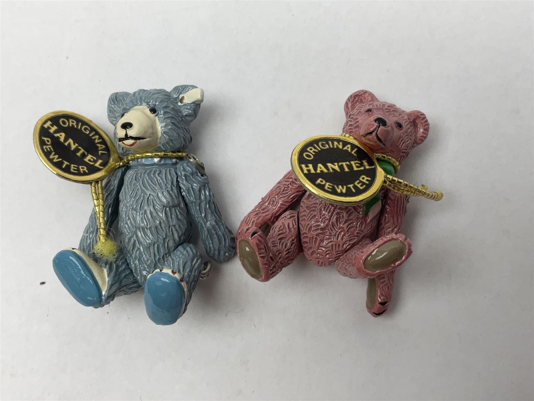 Seven Hantel miniature articulated pewter teddy bears, including bride and groom 