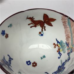 Mid 19th century English porcelain Kakiemon tea wares, decorated in the 'Flying fox' pattern after Meissen, with flying fox and squirrel amidst bamboo and blossoming and fruiting vines, comprising four larger teacups and four smaller, plus eight saucers, each with registration lozenge beneath, larger teacups H6.5cm, saucers D14.5cm