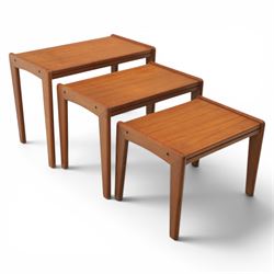 A pair of Nathan 'Highback Carvers' and a 20th century nest of teak tables, (Tables W65cm, D38cm, H49cm)
(Carvers W57, H97)