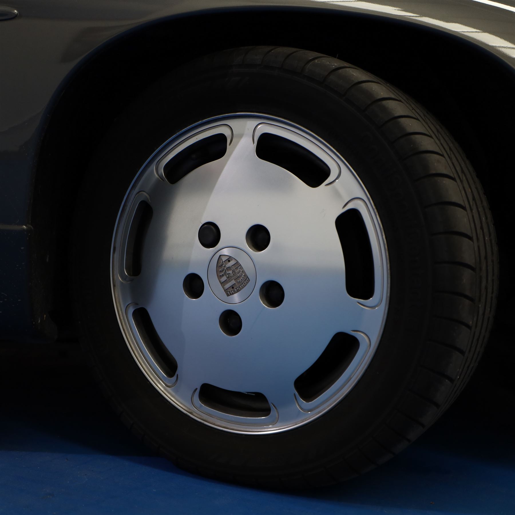 1991 Porsche 928 S4 Automatic Coupé

Registration: L644 LBE
Date of first registration as shown on V5: 1 July 1994
Porsche year of manufacture: 1991
Engine: 5.0-litre V8 petrol
Transmission: Automatic
Odometer reading: 37,886 kilometres (approximately 23,541 miles)
Colour: Slate Grey metallic
Interior: Black leather
V5C: Present
Keys: One
Chassis number: WP0ZZZ92ZMS800460

An exceptional Porsche 928 S4 Automatic Coupé finished in Slate Grey metallic with a black leather interior. The car displays a notably low odometer reading of just 37,886 kilometres, equivalent to approximately 23,541 miles.

The 928 S4 combined Porsche’s powerful 5.0-litre V8 engine with a sophisticated rear-mounted transaxle, creating a refined and accomplished grand tourer. This example is equipped with automatic transmission, electrically adjustable front seats, air conditioning, alloy wheels and the characteristic rear spoiler.

The car was purchased from Specialist Cars of Malton in June 2019, at which time the recorded mileage was 36,650 kilometres. The accompanying service record includes evidence of a cam belt replacement.

Presented in excellent condition throughout, the bodywork and metallic paint finish appear particularly well preserved, while the cabin retains its original character with black leather upholstery and 928-branded sill trims. A Japanese Porsche service label records maintenance entries at 31,902, 33,397 and 34,134 kilometres.

The car also features a Porsche Classic Communications Management (PCCM) upgrade system.

Features

• 5.0-litre V8 petrol engine
• Automatic transmission
• Slate Grey metallic paintwork
• Black leather interior
• Electrically adjustable front seats
• Air conditioning
• Porsche alloy wheels
• Rear spoiler
• Right-hand drive
• Odometer reading of 37,886 kilometres, approximately 23,541 miles
• Purchased from Specialist Cars of Malton in June 2019
• Recorded at 36,650 kilometres when purchased
• Service record showing cam belt replacement
• Japanese Porsche service label
• V5C present
• One key

This vehicle forms part of the Estate of the Late John Sils and is offered for sale by the Executors, confirming a genuine reason for sale.