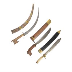 Hunting dagger, with L32cm engraved single edged blade, with a brass deer's foot cross piece with shell guard and horn grip, in a brass mounted scabbard, together with two other daggers