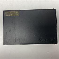 Zenza Bronica ETRS camera body, safari edition, serial no. 7100811, with 'Zenza Bronica Zenzanon EII 1:2.8 f=75mm' lens, serial no. 7908591, film magazine back, safari, serial no. 8100564, AE-ii metering head, safari, serial no. 617024, etc, all in leather case