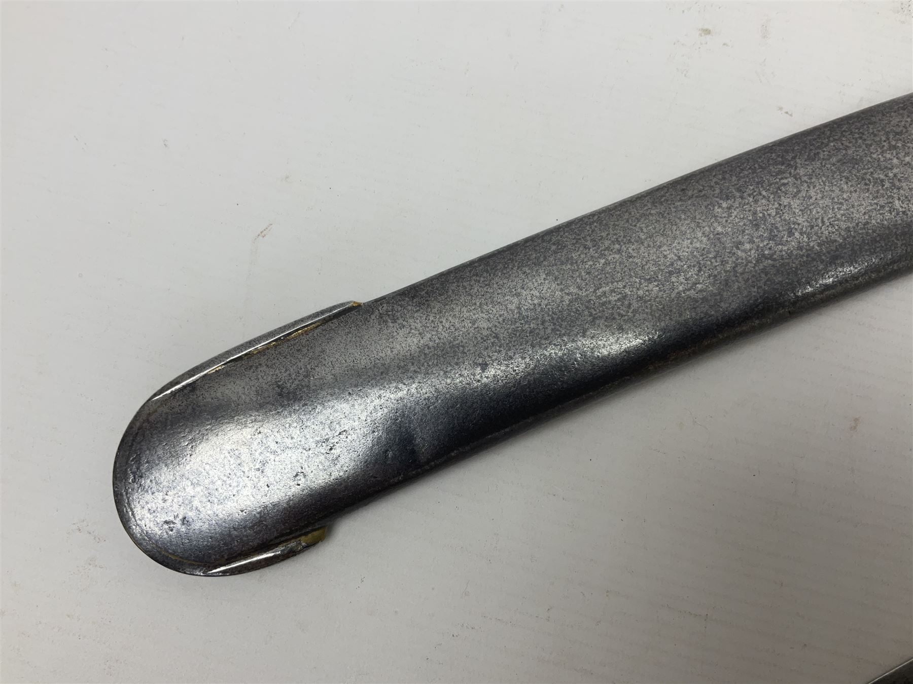 British 1796 Pattern Light Cavalry trooper's sword, the 84cm curving fullered blade stamped Hadley.1 to the back edge, steel hilt with knucklebow, D-shaped langets and leather grip; in polished steel scabbard stamped Osborn & Gunby Birmm. and W.R.16 ( ?16th Light Dragoons) with two suspension rings L100cm overall