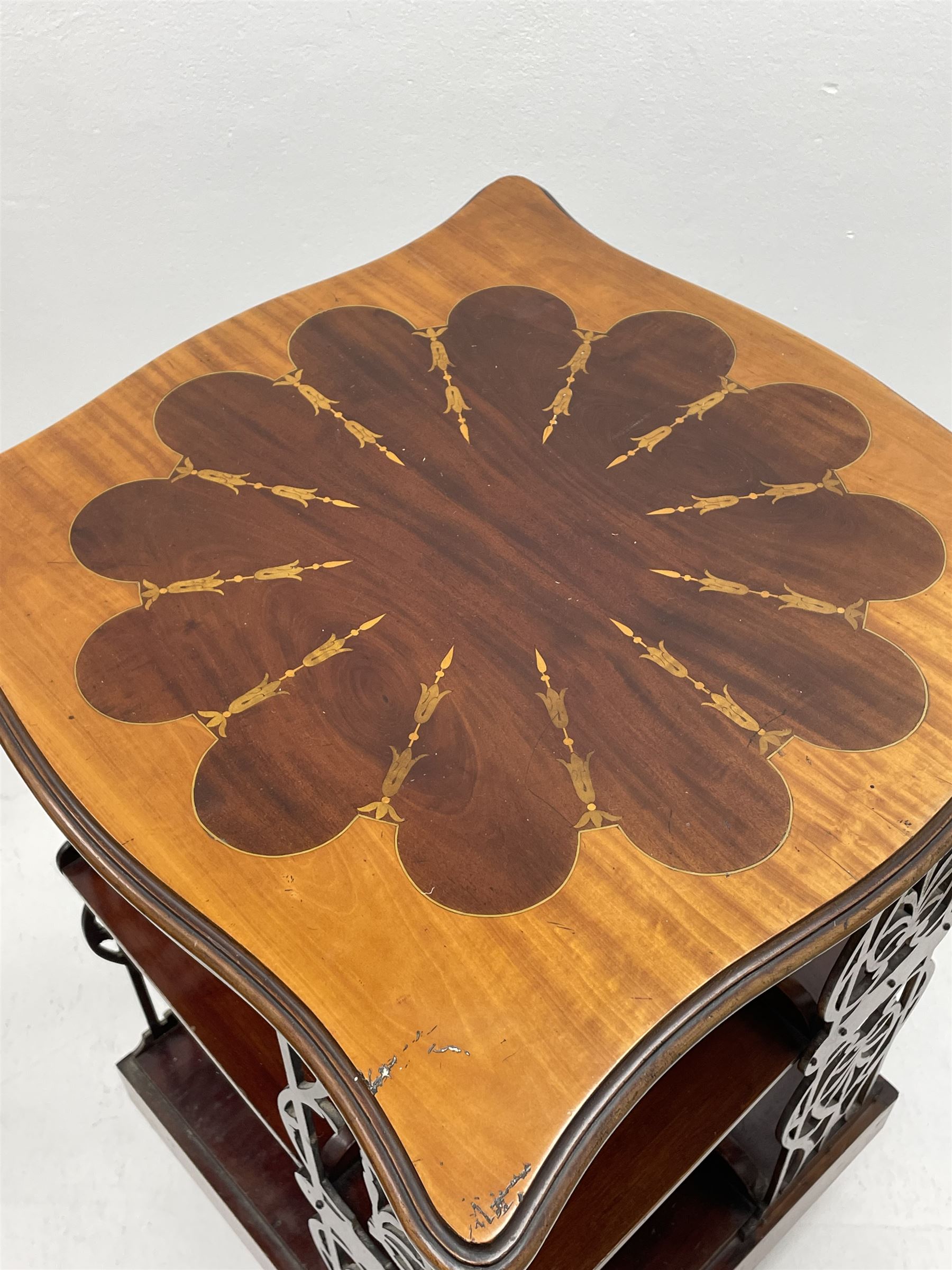 Edwardian inlaid mahogany and satinwood revolving bookcase, shaped moulded top over two tiers with fretwork side splats