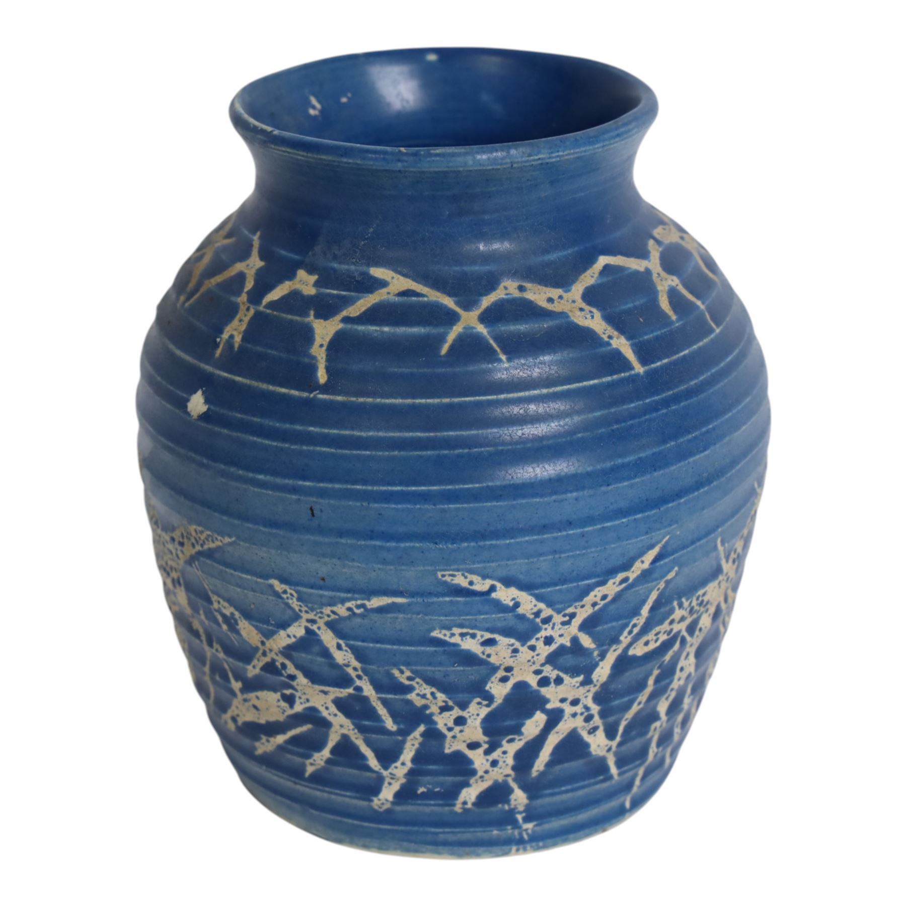 Quentin Bell 1910-1996: ribbed vase with fluted rim, decorated in white abstract design on a blue ground, signed Bell beneath, H16cm 