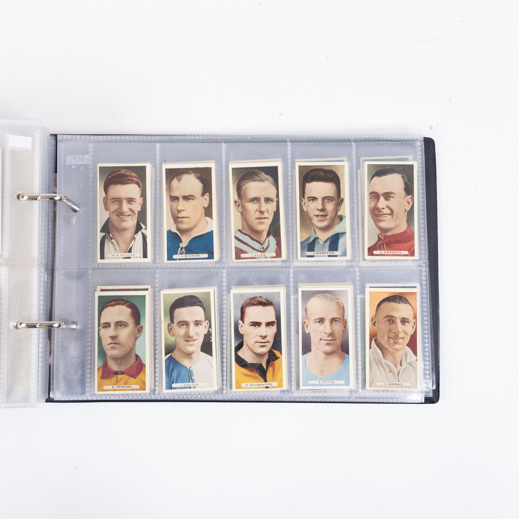 Collection of Edwardian and later Football related trading and cigarette cards, including forty-nine of fifty 1906 Ogden's Football Club Colours, 1922 PALS Footall series, ninety of one hundred 1925 Gallaher Famous Footballers, complete set of forty-four 1926 Ogden's Captains of Association Football Clubs and Colours, complete set of fifty 1927 Players Football Caricatures by MAC,  complete set of fifty 1927 Players Football Caricatures by RIP,  complete set of fifty 1930 Players Association Cup Winners, complete set of 50 1933 Ogdens AFC Nicknames etc, housed in brown cigarette card album