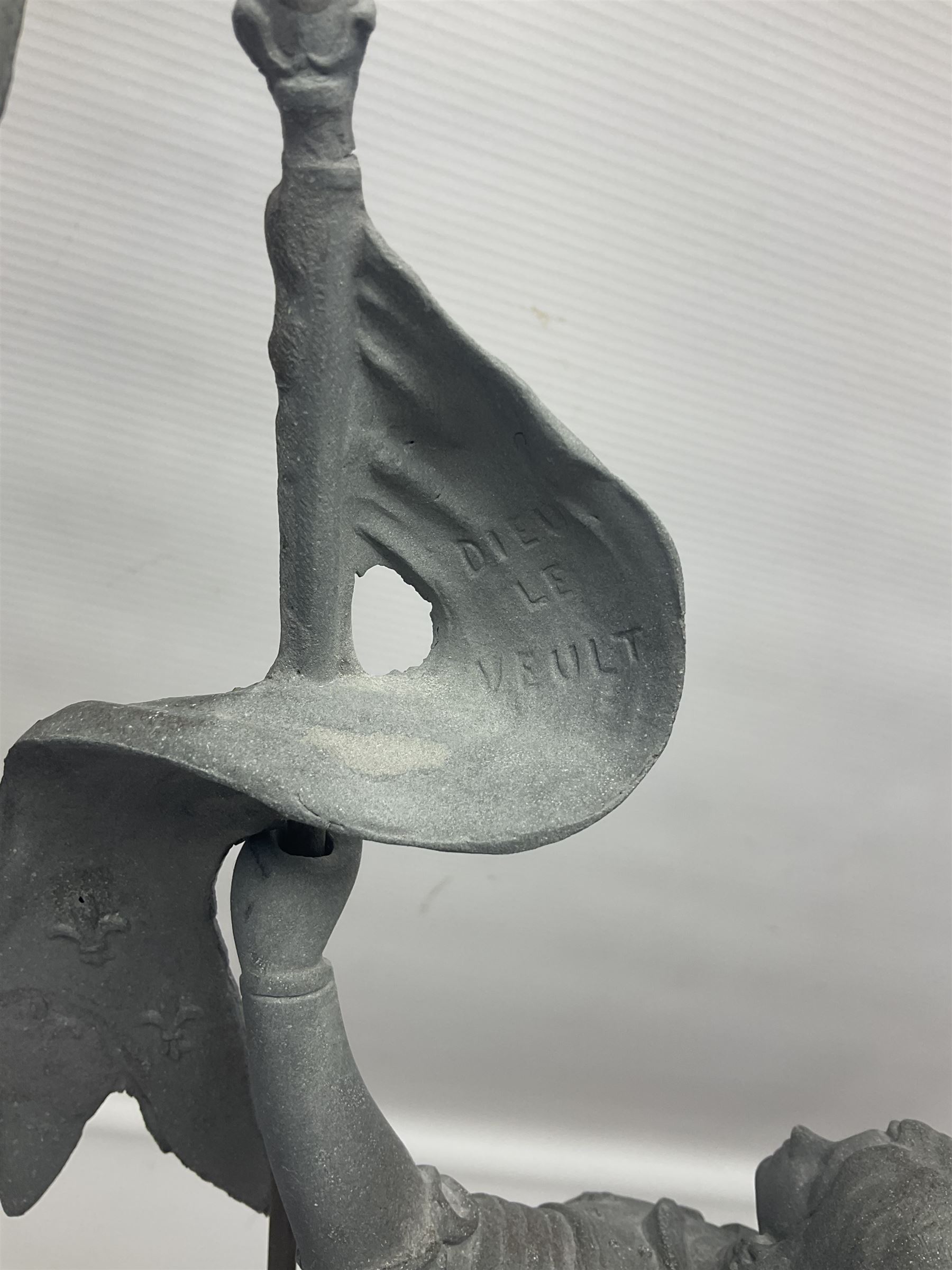 Pair of spelter figures modeled as Cavaliers, together with a spelter figure of Joan of Arc, largest H52cm