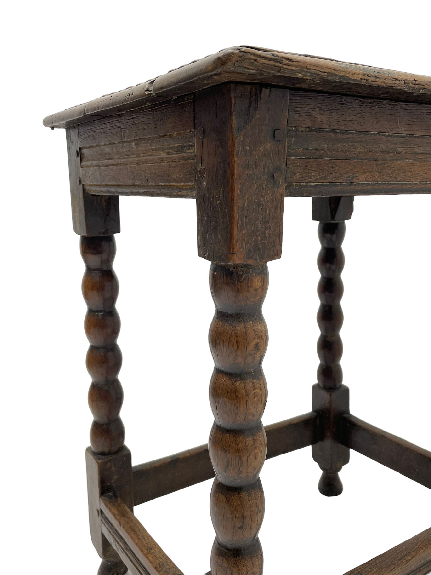 18th century oak joint coffin stool, moulded rectangular top over moulded frieze rails, raised on bobbin turned supports joined by moulded stretchers