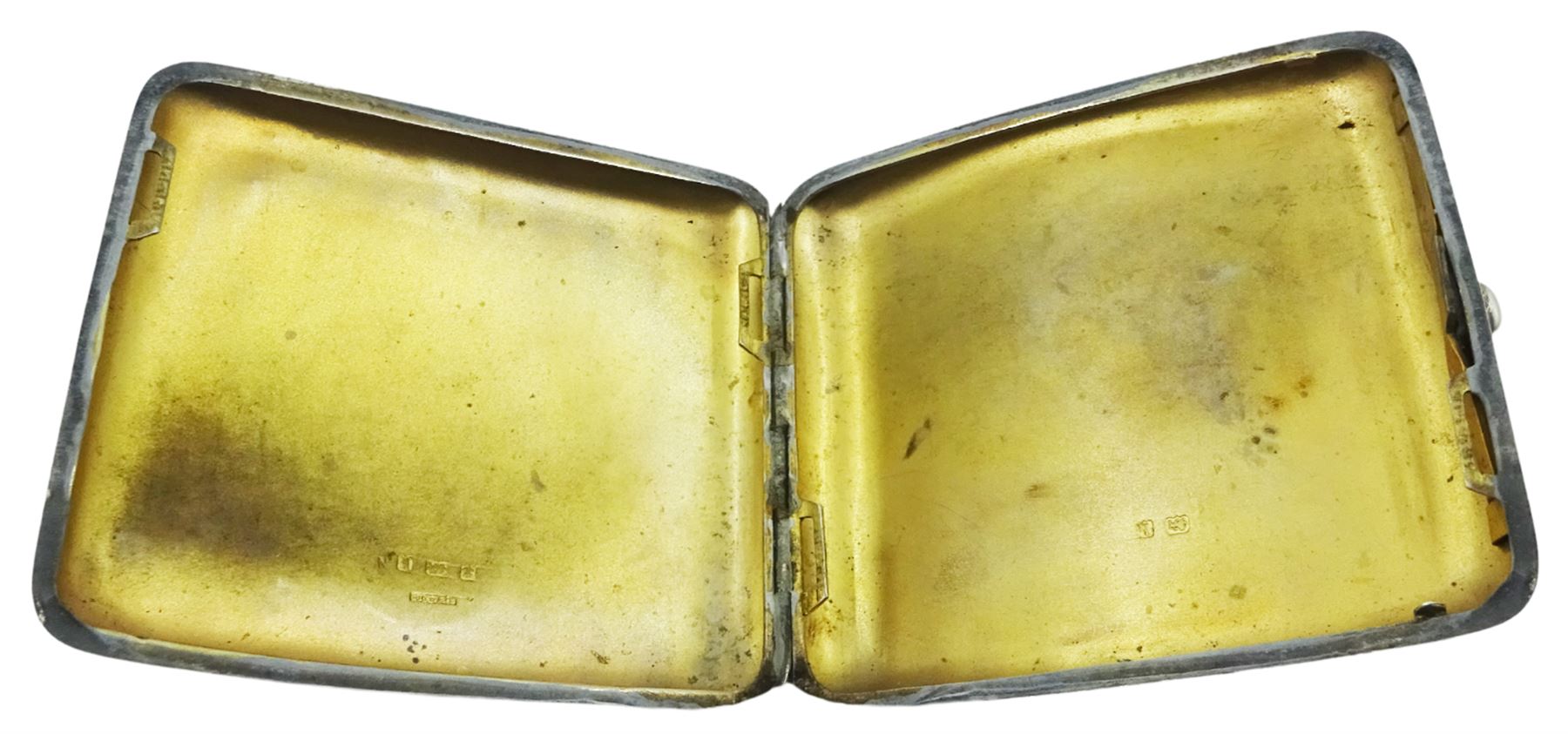Edwardian silver cigarette case, of rounded rectangular form with engraved scrolling foliate decoration and central panel with monogram, hallmarked S Blanckensee & Son Ltd, Birmingham 1907, H8.5cm W9cm, approximate weight 3.22 ozt (100.3 grams)