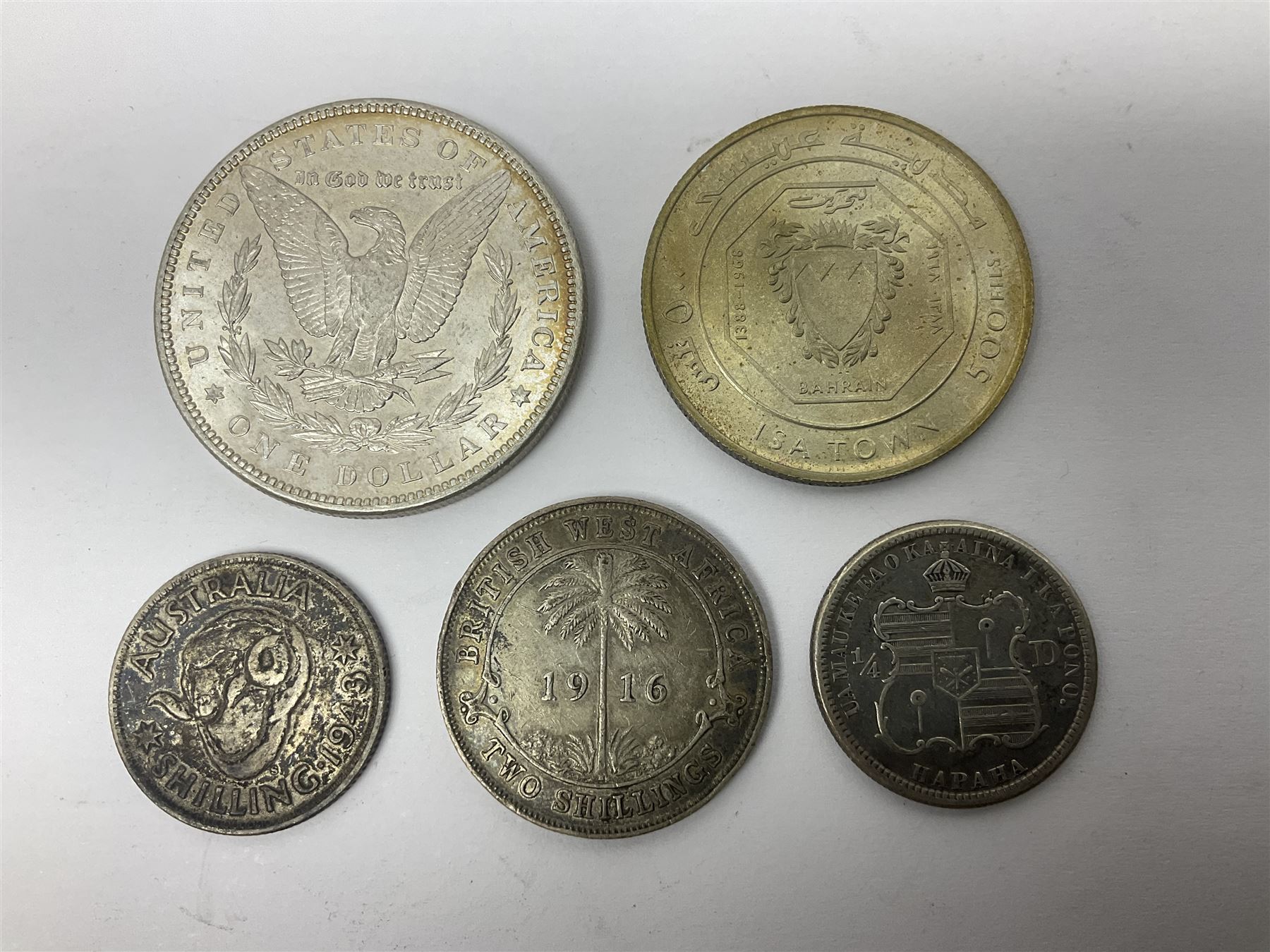 King George V British West Africa 1916 two shillings coin, King George VI Australia 1943 shilling, United States of America 1887 Morgan dollar, Bahrain 1968 500 fils silver coin, Maria Theresa restrike thaler and other coinage 
