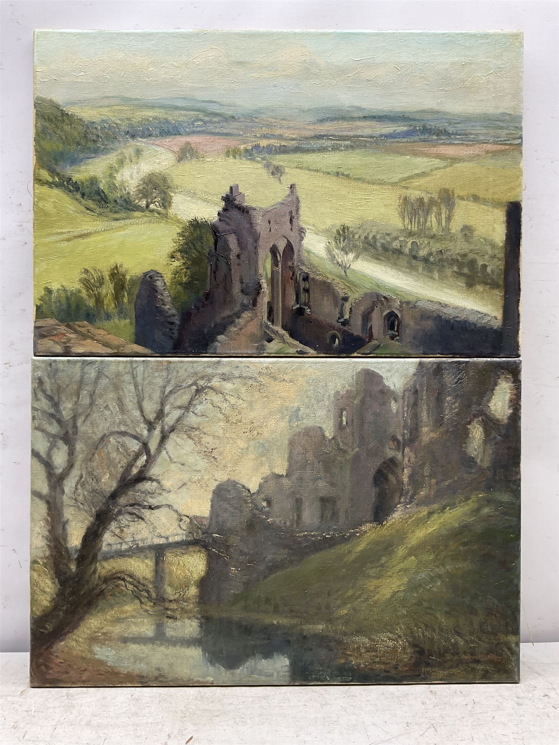 Arthur Tunstall (British mid/late 20th century): 'Goodrich Castle on the River Wye' and a companion Castle view,  pair oils on canvas the first signed with initials and titled verso on artist's studio label dated 1971, 40cm x 61cm (2) unframed