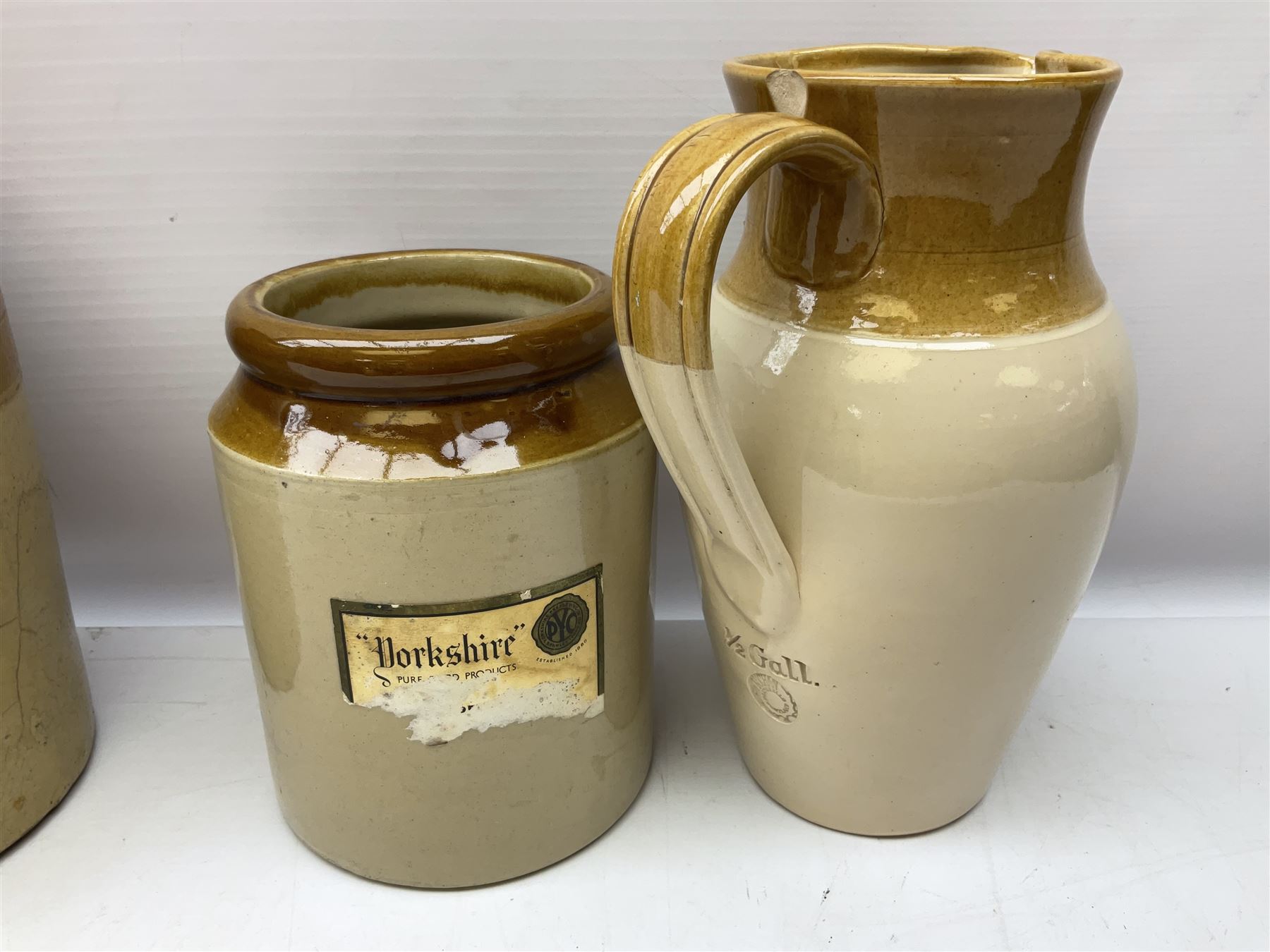 Quantity of salt glazed stoneware flagons, two tone jars and jug etc, to include some with impressed marks and labels, largest H26cm