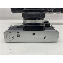 Four Olympus camera bodies, including Olympus OM10, serial no 20744269, with 'Olympus OM-System Zuiko Auto-S 50mm 1:1.8' lens serial no 3633644, Olympus OM-2 camera body serial no 460280 with 'Olympus OM-System G.Zuiko Auto-s 1:1.4 f=50mm' lens, serial no 729750, etc 