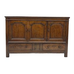 19th century and later oak cupboard, fitted with three cupboards and two drawers, enclosed by stepped and shouldered panelled doors, stile supports