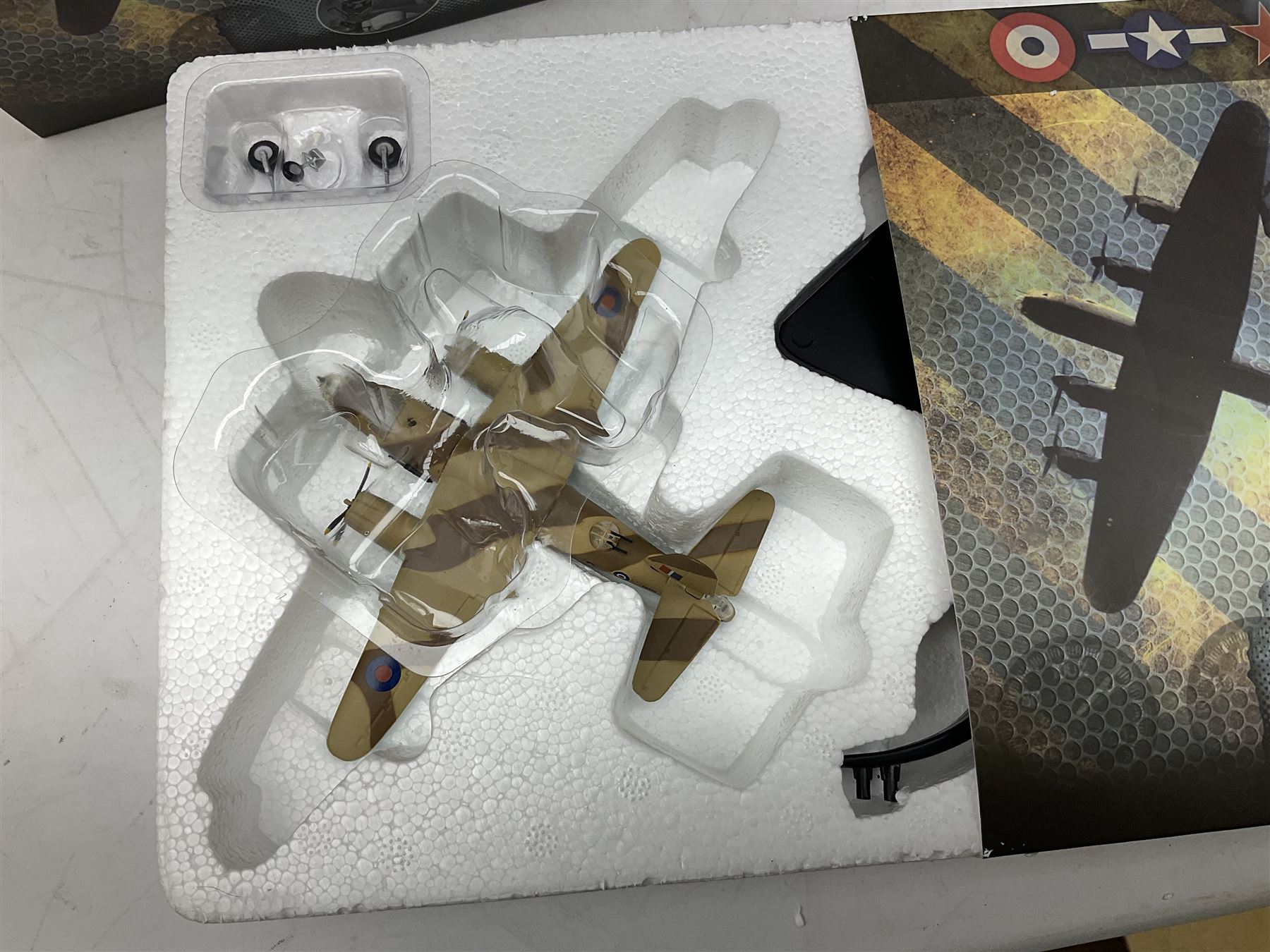 Nineteen Atlas Editions die-cast models of aircraft; to include Douglas Dakota C-47, Forke Wulf, Handley Page Halifax, De Havilland DH-98 Mosquito Mk.IV, etc and two others similar by IXO Models; all boxed (21)

