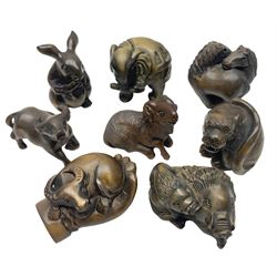 Eight netsuke, modelled as ox, warthogs, ram, tiger, rabbit, horses etc