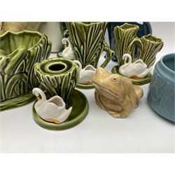 Sylvac budgieregar wall pocket, together with other Sylvac cermics including swan vases, blue tit vase and a frog figure etc, all with printed or impressed marks beneath, and a Poole Pottery cat figure, with printed mark beneath, wall pocket H22cm