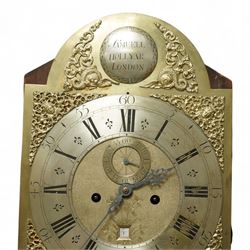 Samuell Hollyar of London - mid-18th century, figured mahogany Longcase clock with a swan neck pediment and brass parterre, with glass panels to the sides and reeded pilaster flanking the hood door, conforming recessed pillars to the trunk and a wavy toped door with  inlay, square plinth raised on bracket feet, With a brass dial with cast spandrels and makers name to the arch, matted dial centre with steel hands, seconds dial and date aperture, silvered chapter with Roman numerals, five minute Arabic's, minute and inner quarter hour tracks, dial pinned to an 8-day rack striking movement, sounding the hours on a bell. With weights and pendulum.
Samuel Hollyar is recorded as being apprenticed in London in 1683 and a member of the clockmakers company 1705-20.