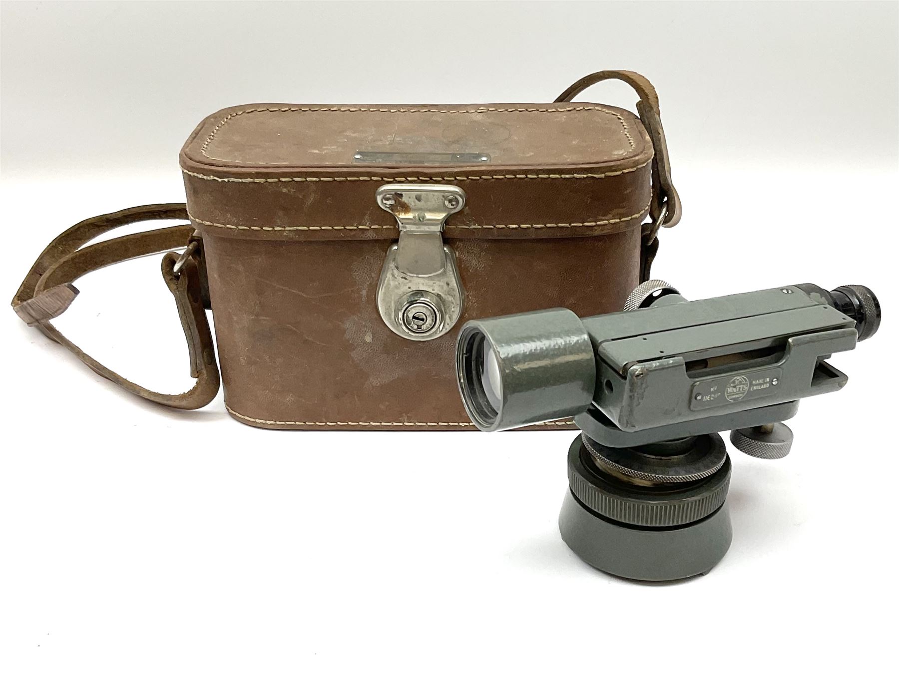 Black finished monocular microscope by Prior London No. 17372,  with pitchfork base and rack and pinion focusing, in original fitted wooden case with additional lenses, H32cm, together with Watts dumpy level, no. 116249, in a leather case