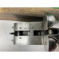 Midland Gun Company Birmingham & London 12-bore side-by-side box-lock non-ejector double barrel shotgun with 76cm damascus barrels, Prince of Wales style walnut stock with chequered grip and fore-end, top safety and engraved lock no.62160 L120cm overall; in scratch built baize lined wooden case. SHOTGUN CERTIFICATE REQUIRED.