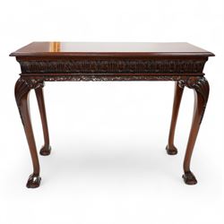 Georgian design mahogany console or side table, moulded rectangular top over palmette carved frieze, decorated with scrolling leafage, shell and bell flower carved cabriole supports with ball and claw feet 