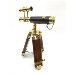 Reproduction telescope on tripod stand, plaque to the top reading 'Victorian Marine Telescope London 1915', H34cm