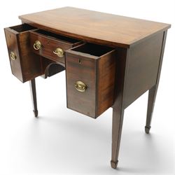 Small late 18th century inlaid mahogany sideboard, with bow fronted top with crossbanded edge, central drawer flanked by a drawer each side, kneehole cut out, raised on square tapering supports terminating in spade feet