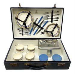 Vintage Harlequin picnic case, with tin sandwiches boxe, ceramic cups, plates, bowls and flatware for four settings, L48cm, H30cm