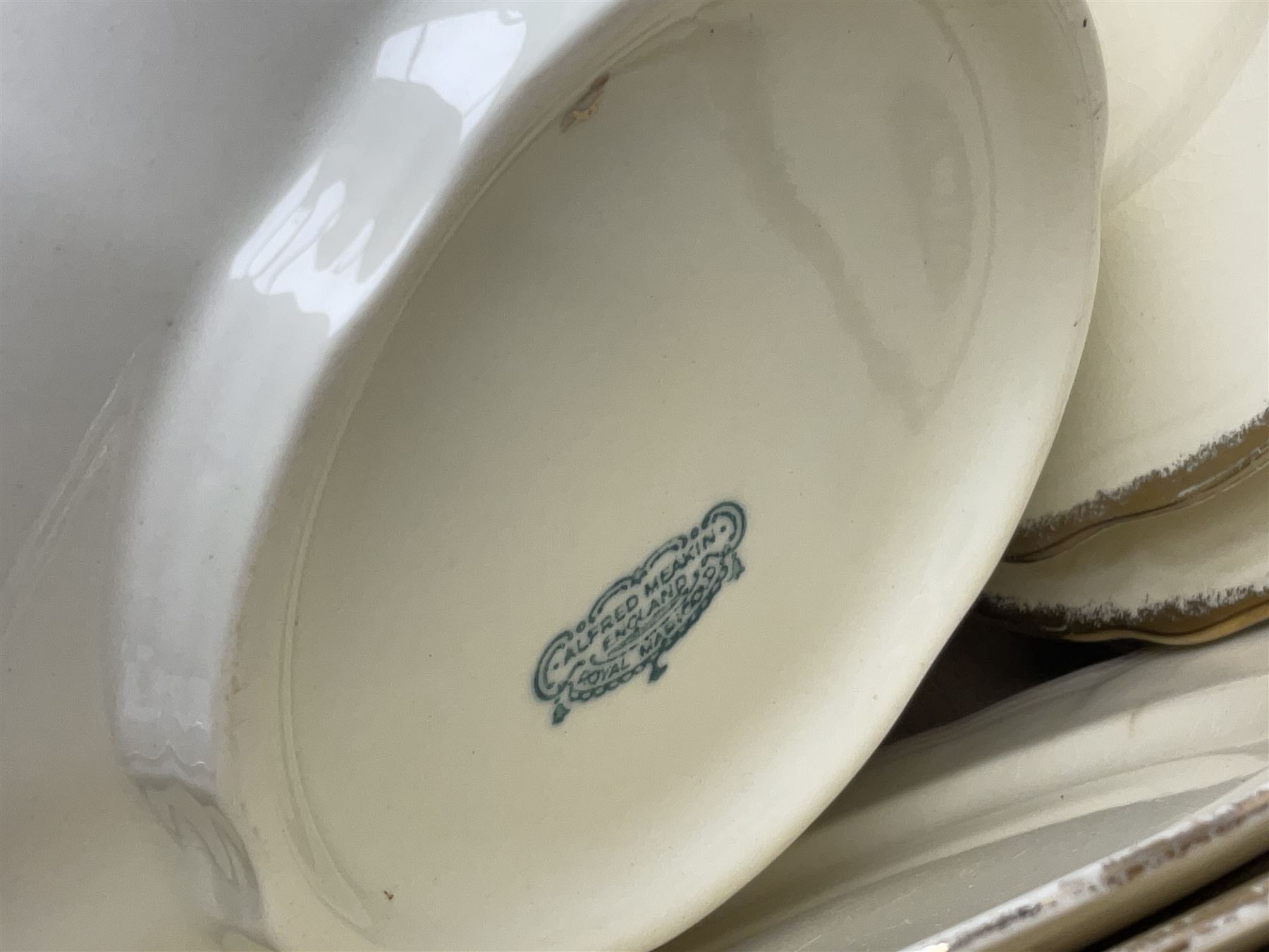 Royal Albert Masquerade pattern tea service for six, together with Royal Albert Dogwood pattern teacup and saucer and Alfred Meakin tea and dinner wares decorated with gilt on cream ground to include lidded tureens and oval serving plates etc in two boxes