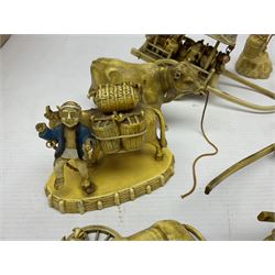 Collection of Japanese celluloid figures, including Rickshaw groups, fishing scene, oxen etc 