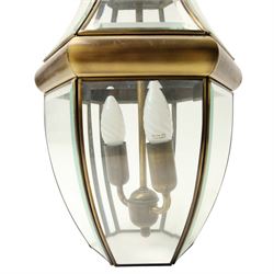 Two light hall lantern in metal and bevelled glass case, drop H64cm